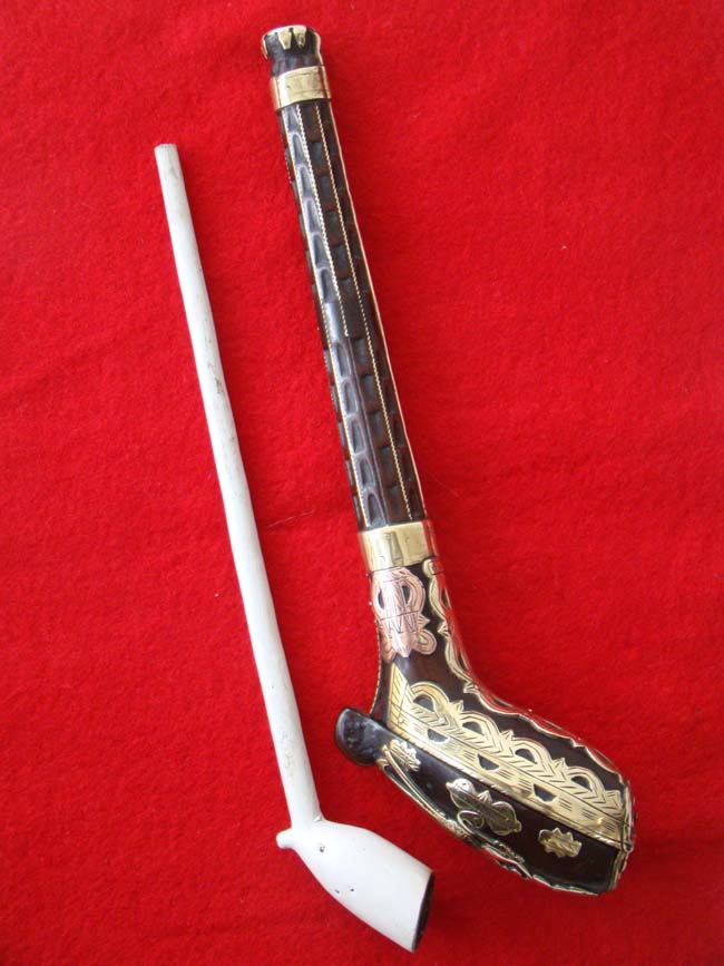 A rare early 18th century Dutch brass and copper inlaid fruitwood pipe case circa 1720